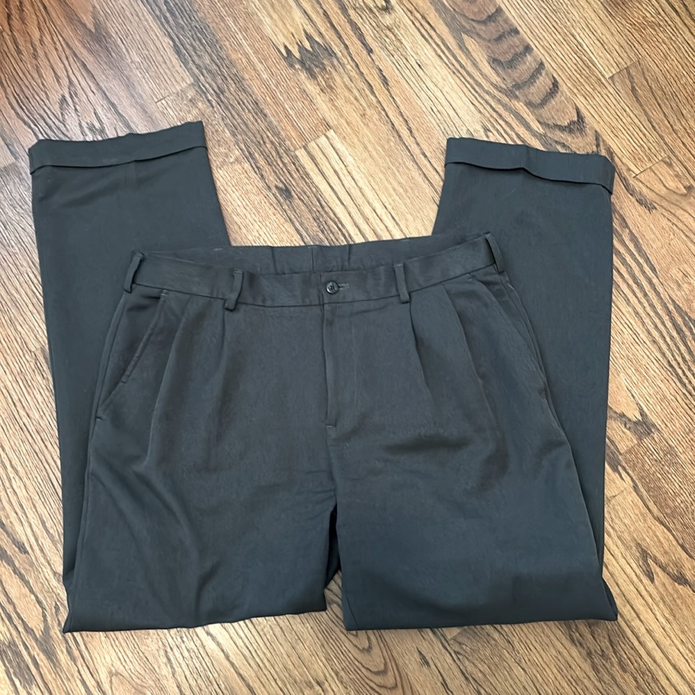 Van Heusen dark grey pleated and cuffed dress slacks. 34x32